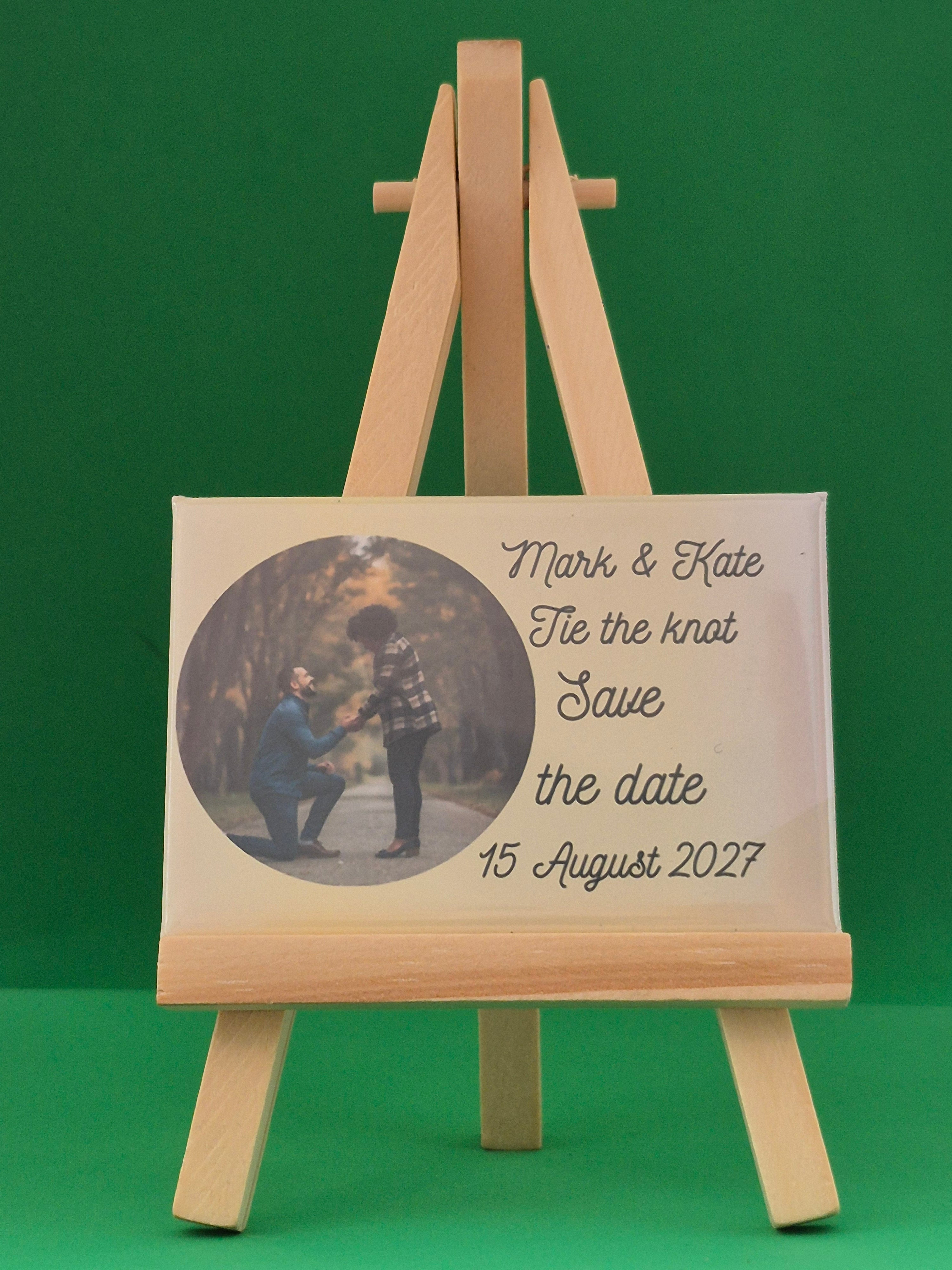 magnet showing a proposal with text of wedding date