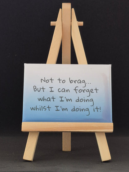 Small easel with a magnet on a black background